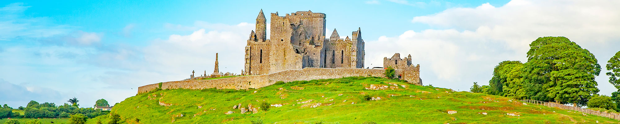 Peaceful Irish landscape view, Rock of Cashel ruined castle on background in Tipperary county